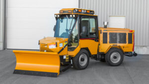 Trackless Front Mount Spreader & Plow